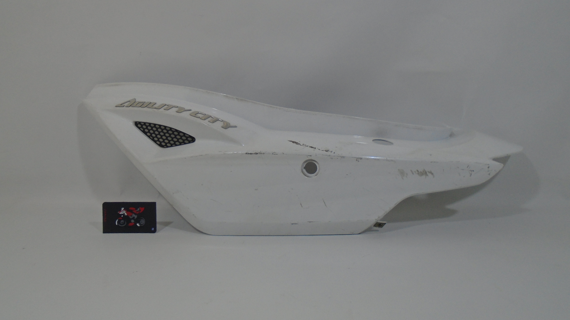 TAPA LATERAL TRASERA IZQUIERDA BLANCA KYMCO AGILITY CITY (E4)