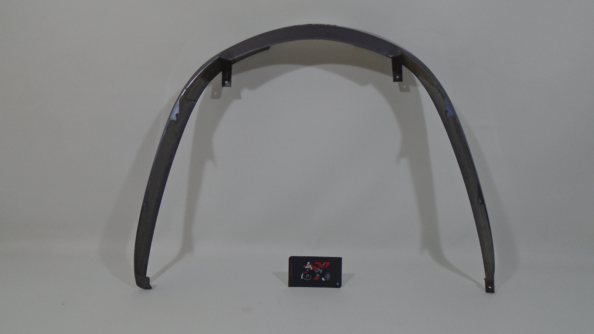 TAPA INFERIOR PILOTO TRASERO
COLOR GRIS SIN ADHSIVO HNDA HONDA FORZA 250 2005/2007