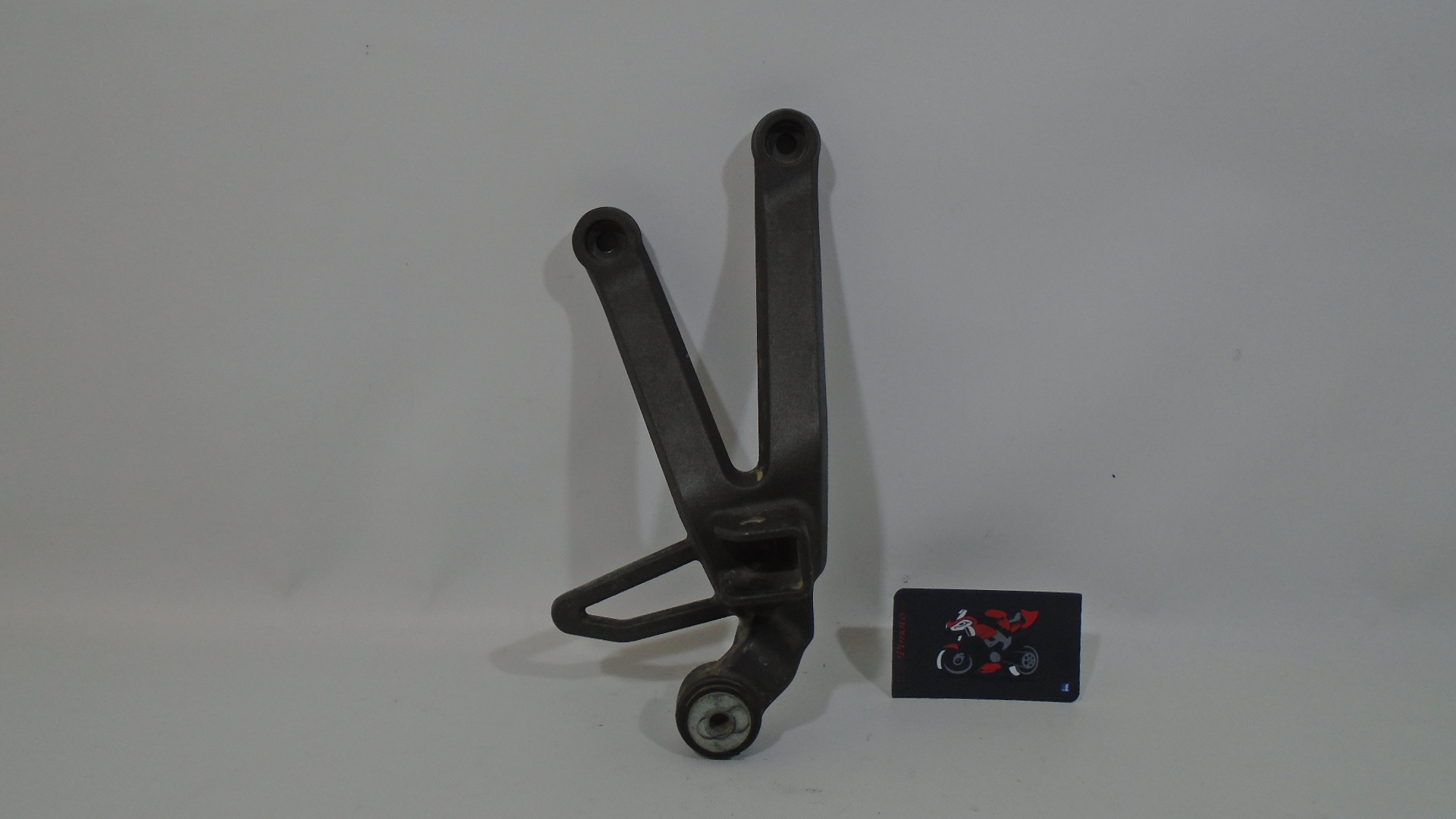 SOPORTE ESTRIBO TRASERO DERECHO KYMCO QUANNON 125