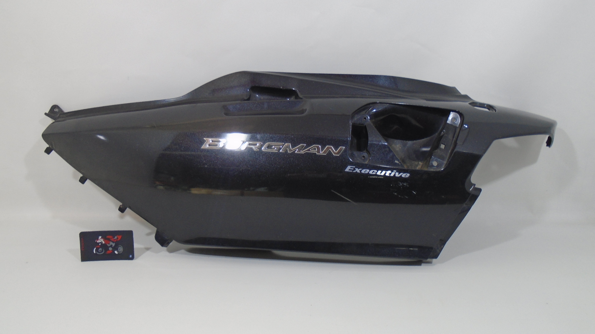 TAPA LATERAL TRASERA IZQUIERDA SUZUKI BURGMAN 650 2002/2012