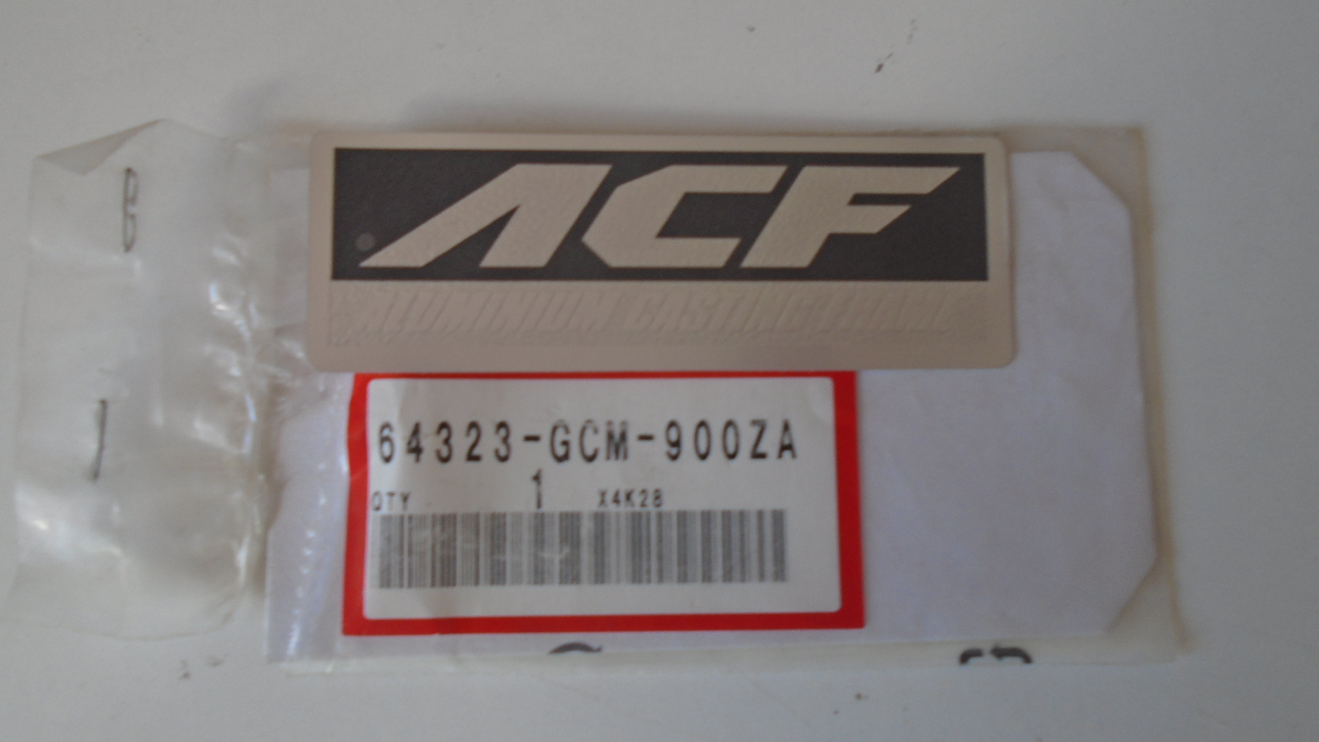 64323-GCM-900ZA ADHESIVOS OEM HONDA.