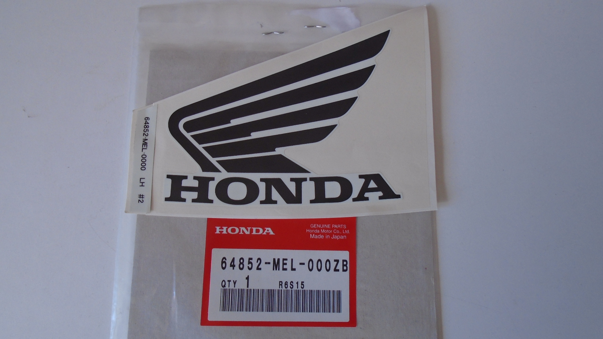 64852-MEL-000ZB ADHESIVOS OEM HONDA.