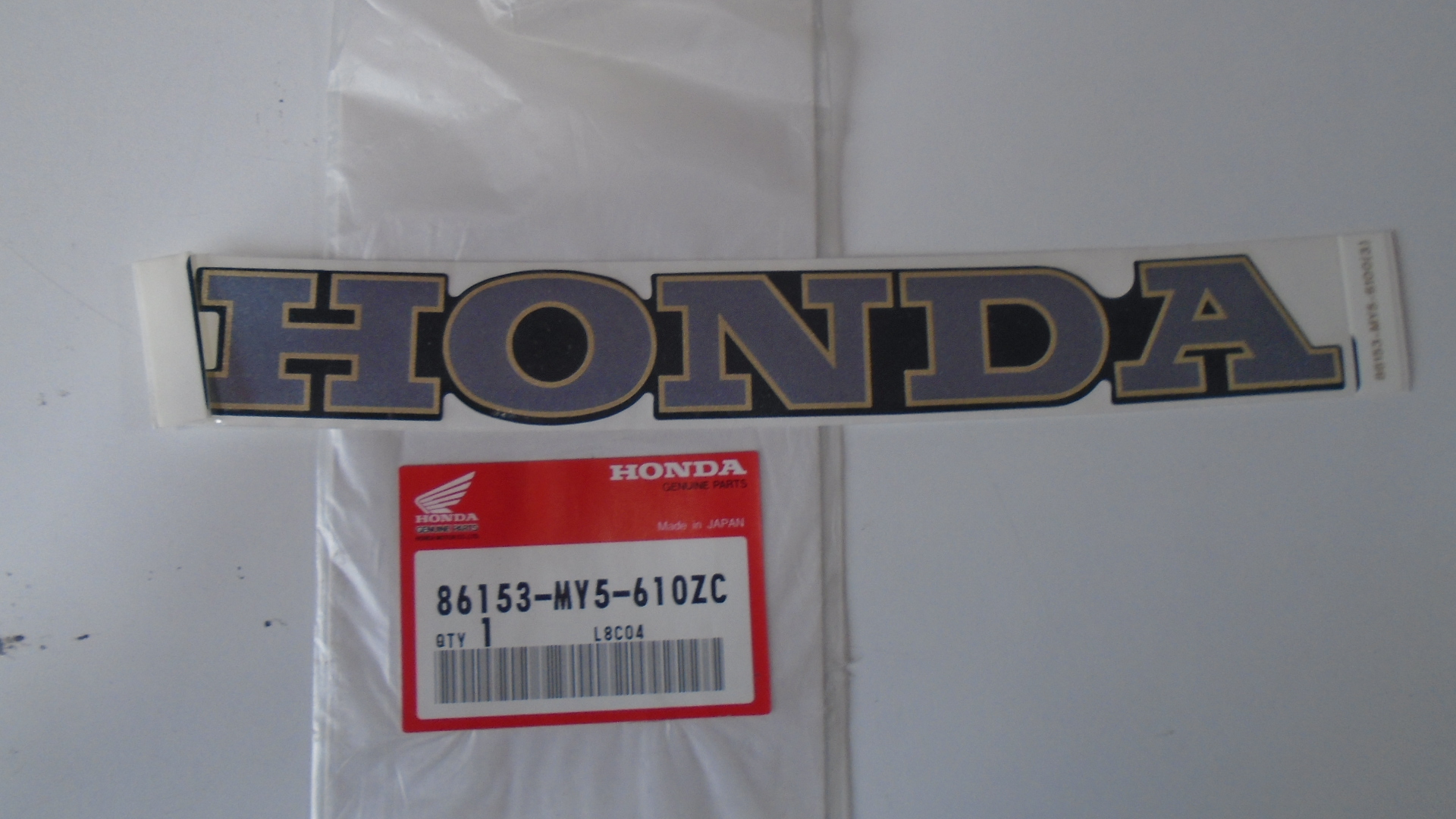86153-MY5-610ZC ADHESIVOS OEM HONDA.