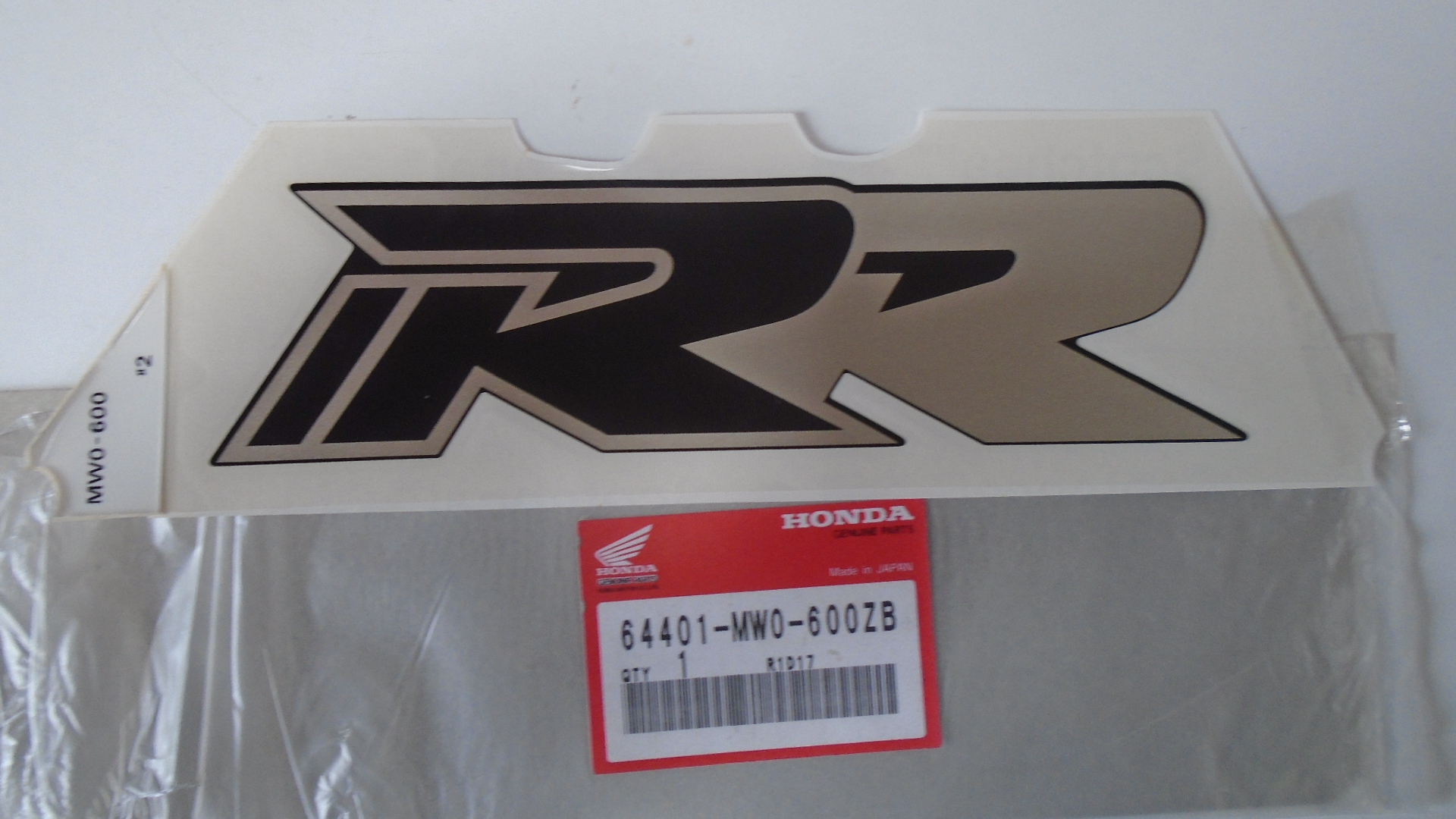 64401-MW0-600ZB ADHESIVOS OEM HONDA.